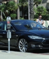 ALYSON HANNIGAN and Her Tesla Electric Car in Santa Monica