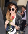 DEMI LOVATO outside her hotel in London