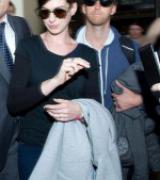 ANNE HATHAWAY at LAX Airport in Los Angeles