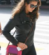 NINA DOBREV at LAX Airport in Los Angeles