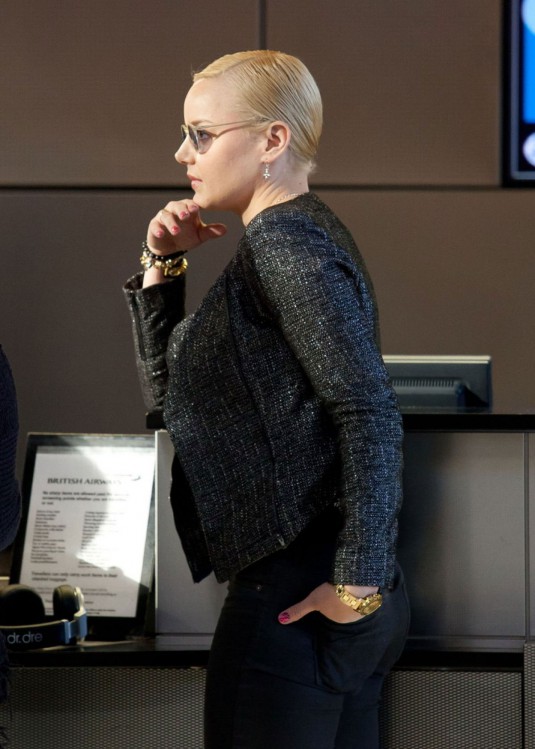 ABBIE CORNISH at LAX Airport in Los Angeles