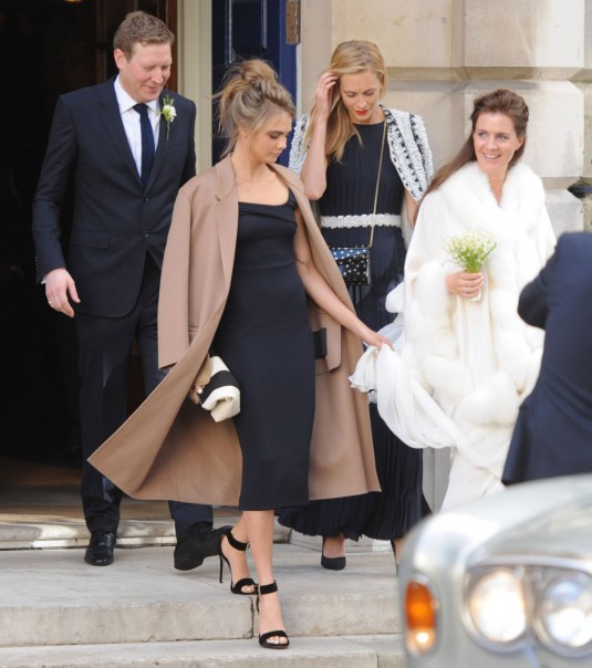 CARA DELEVINGNE at Her Sister Chloe Wedding in London