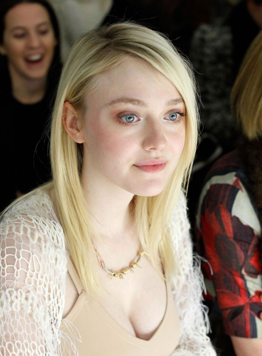 DAKOTA FANNING at Rodarte Fashion Show in New York
