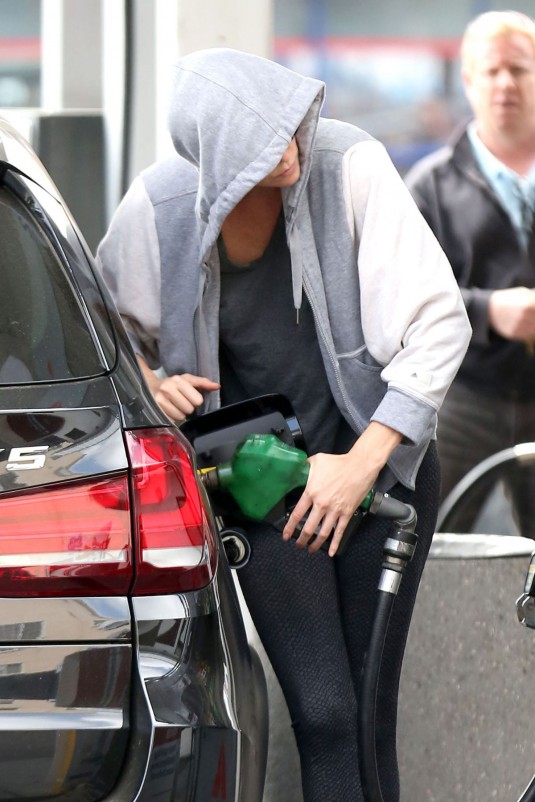 CHARLIZE THERON at Gas Station after a Yoga Class  in West Hollywood
