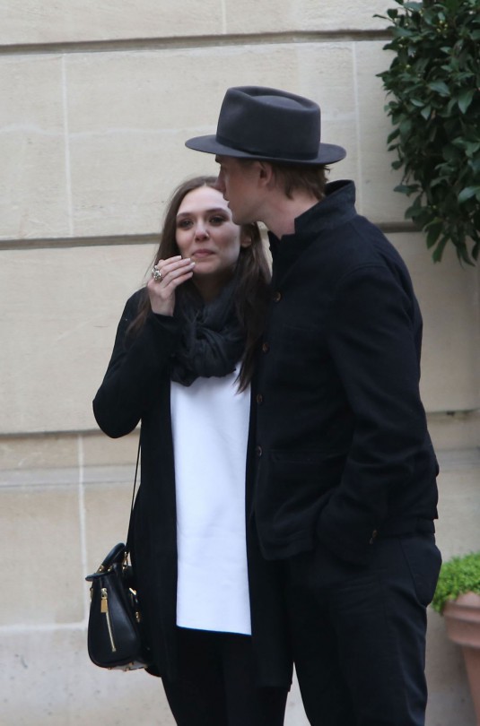 ELIZABETH OLSEN and Boyd Holbrook Out in Paris