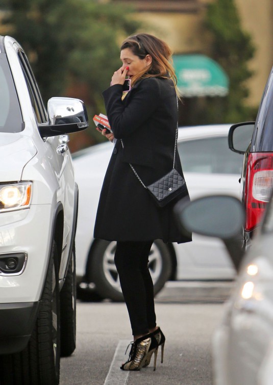 KELLY BROOK leaves Rite Aid Pharmacy in Hollywood