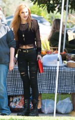 BELLA THORNE on Set to Film "Amityville" in LA