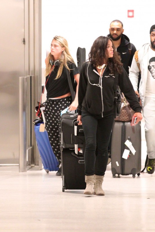 CARA DELEVINGNE and MICHELLE RODRIGUEZ Arrives at Miami Airport